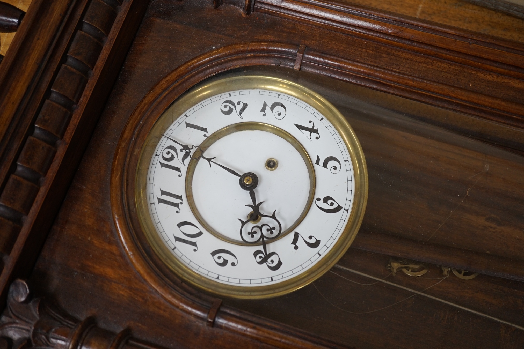 An early 20th century mahogany Vienna wall clock, 122cm. Condition - fair, glass loose, not tested as working